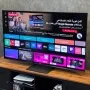 صفحه اصلی AI Home تلویزیون ال جی QNED93A6A با نمایش برنامه‌ها و پروفایل شخصی