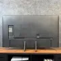 نمای پشتی تلویزیون سامسونگ Q8F با بدنه پلاستیکی و شیارهای مدیریت کابل